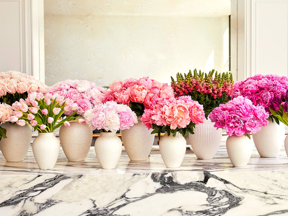 Flowers in vases on a marble table