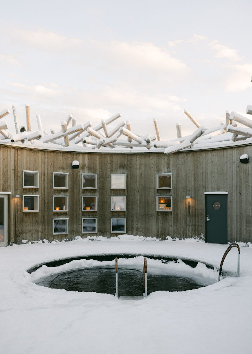 Steps into the natural ice bath at Arctic Bath hotel, Swedish Lapland