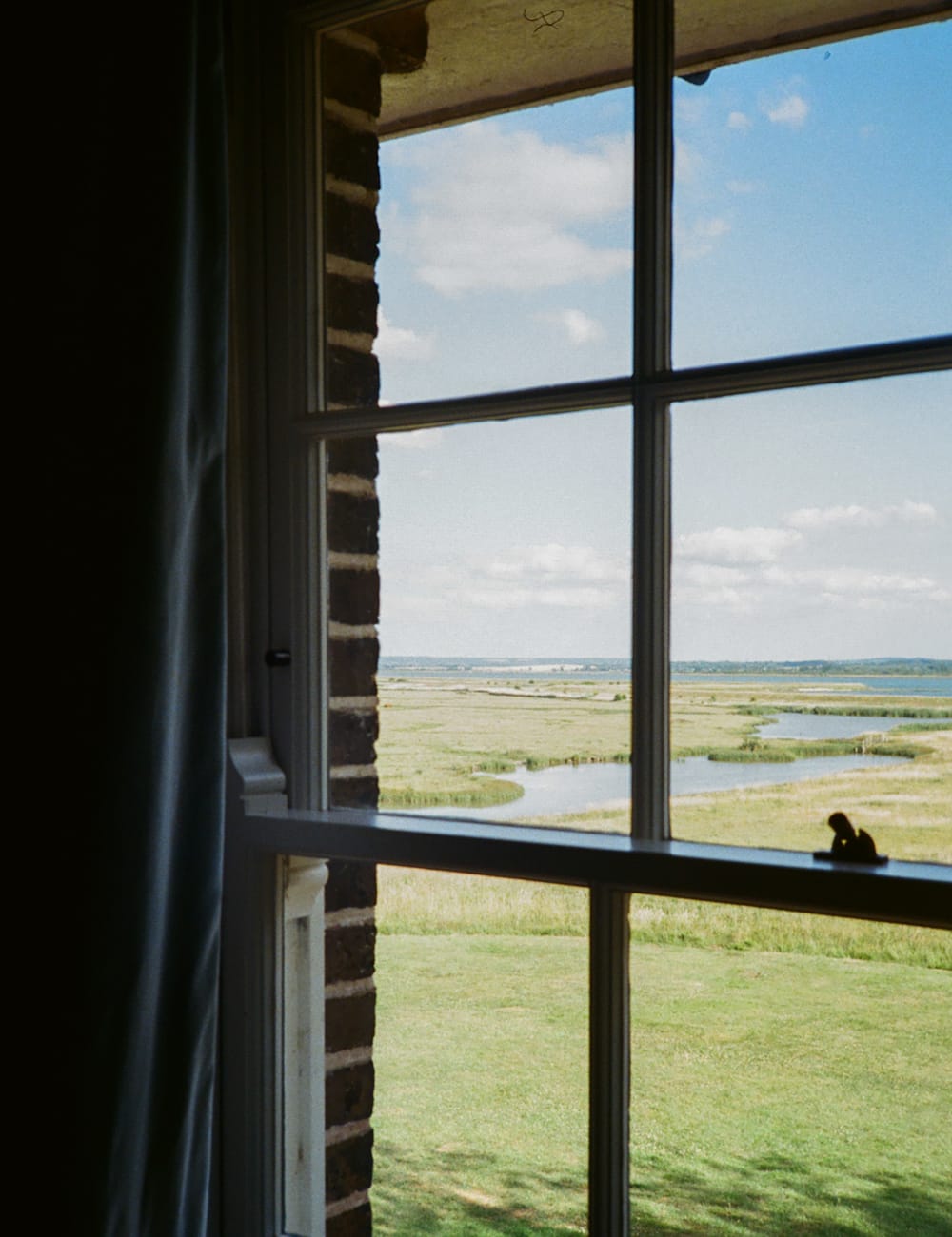 Marsh view from a bedroom window at Elmley Nature Reserve