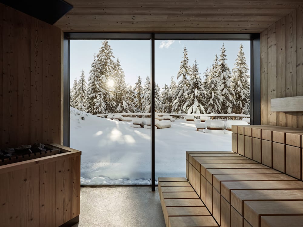 Sauna with the view of snow covered trees