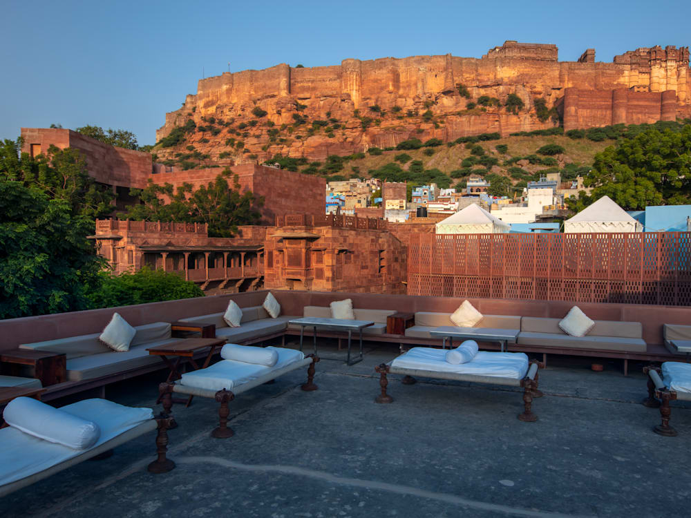 Rooftop bar at Raas Jodhpur in India with mountain views