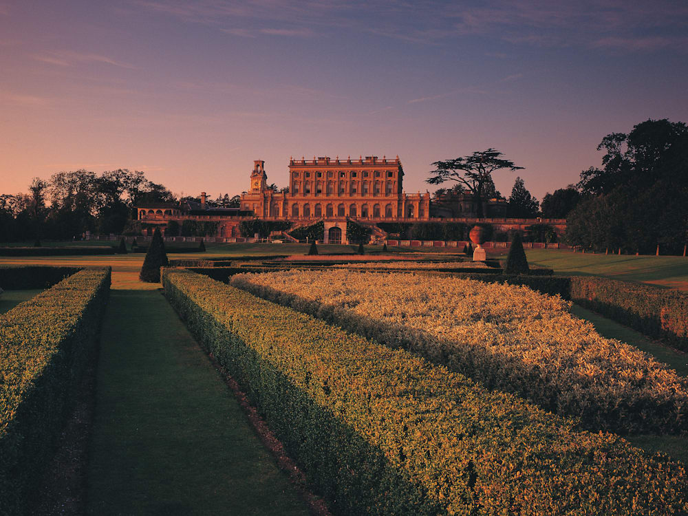 Hotel exterior and gardens in the sunset