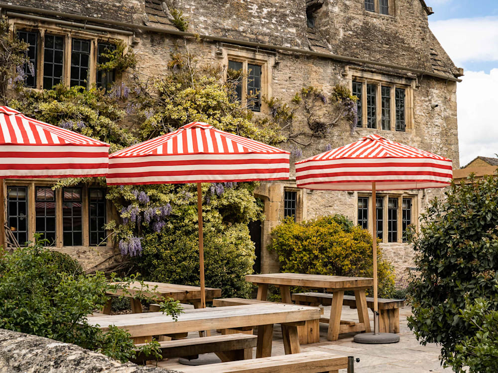 Hotel exterior with picnic benches