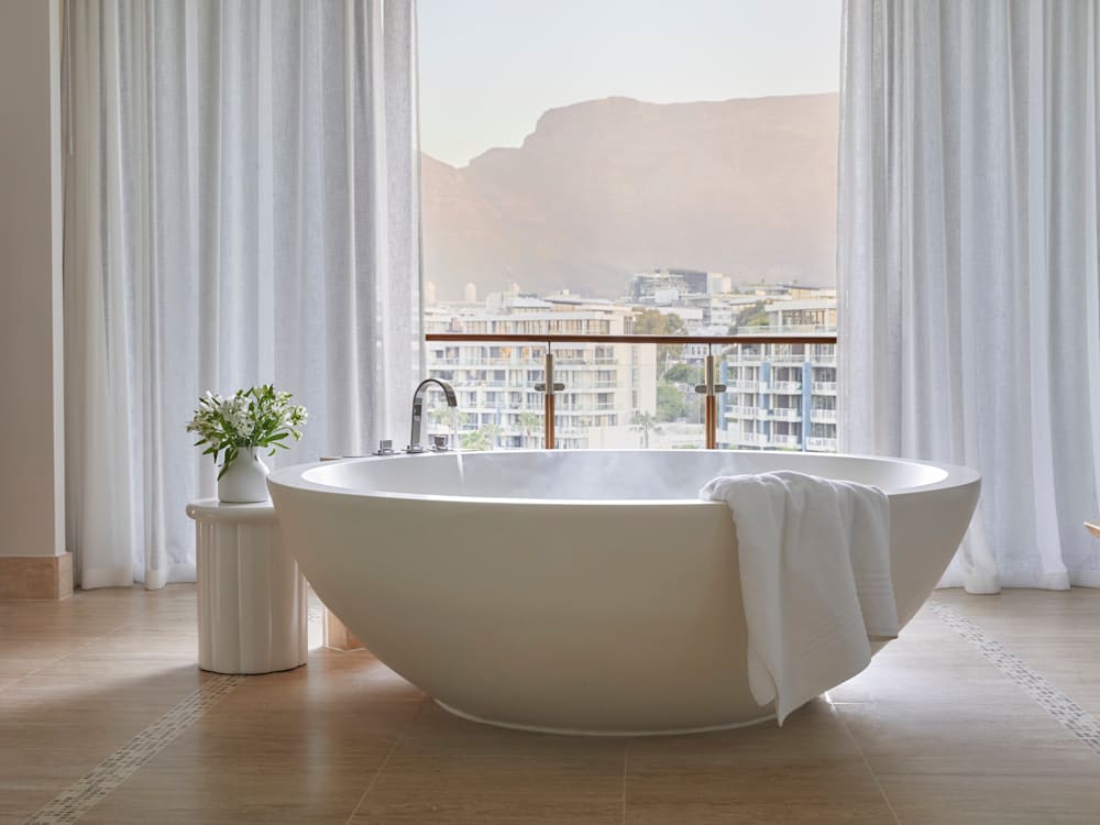 Suite bathroom with mountain view