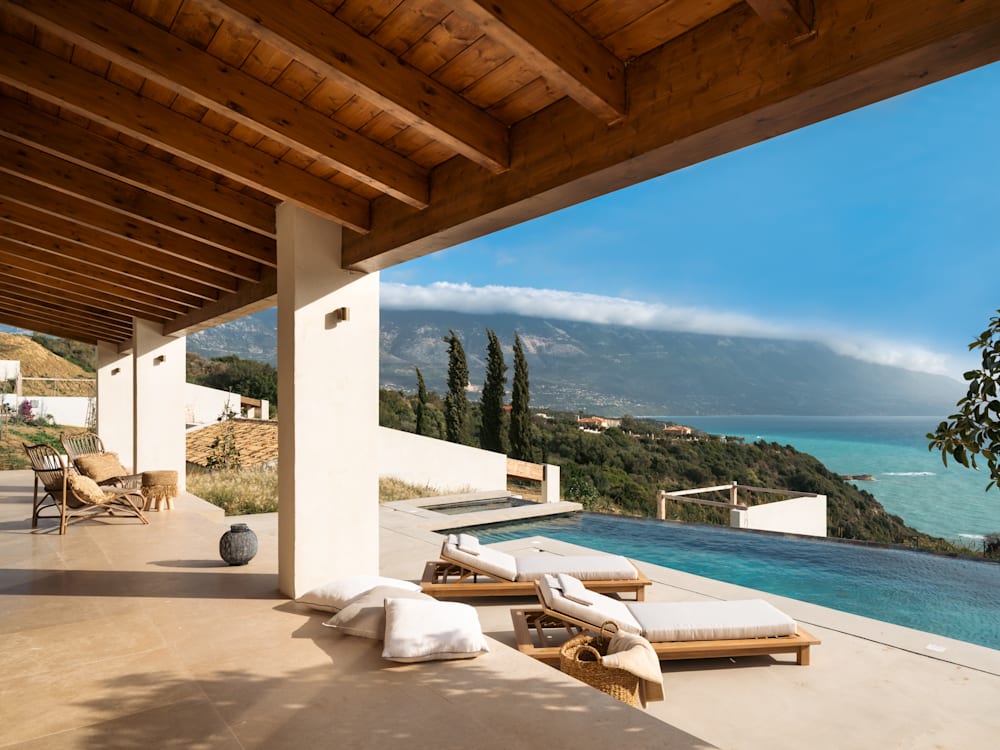 Swimming pool in Greek Island looking out to the sea