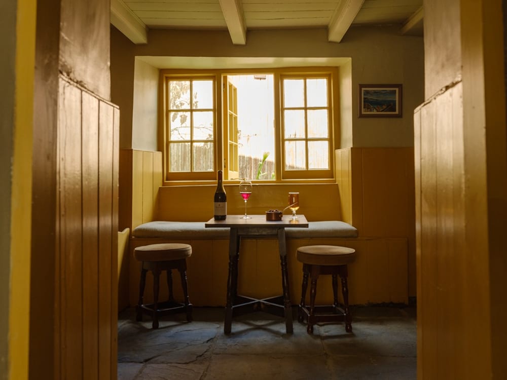 The Standard Inn table and glasses of wine