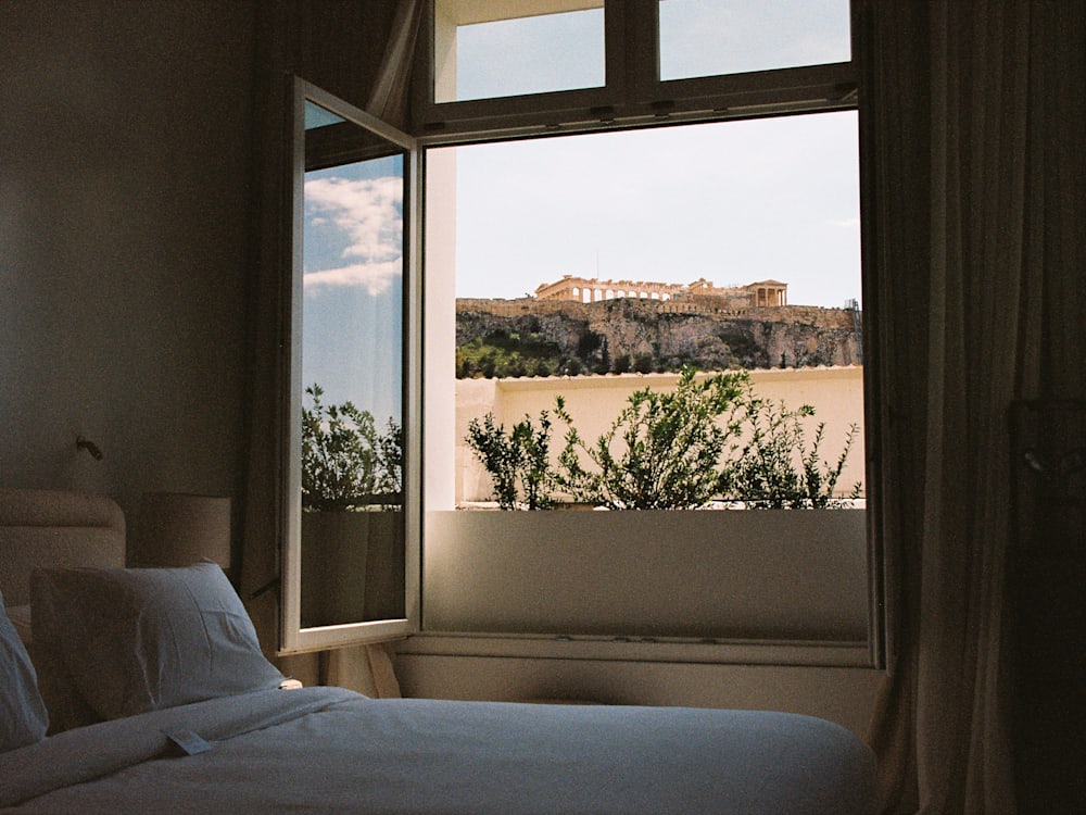 The Acropolis from the window of a bedroom at the Dolli hotel in Athens – by Chris Wallace for Mr & Mrs Smith