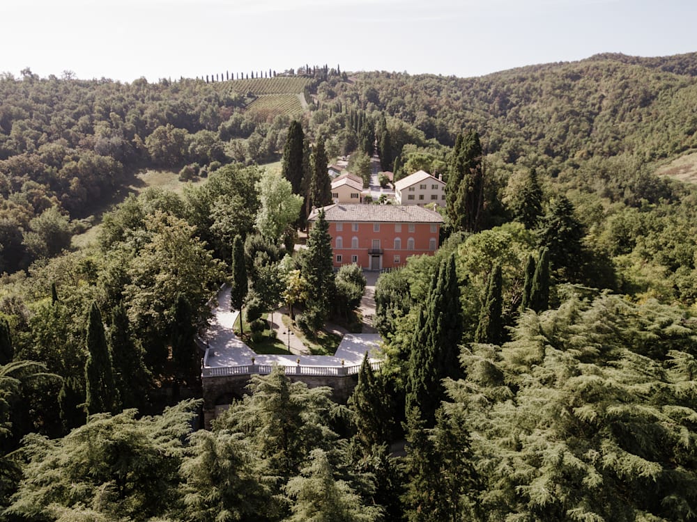 Roncolo 1888 hotel and its forest surrounds pictured from above