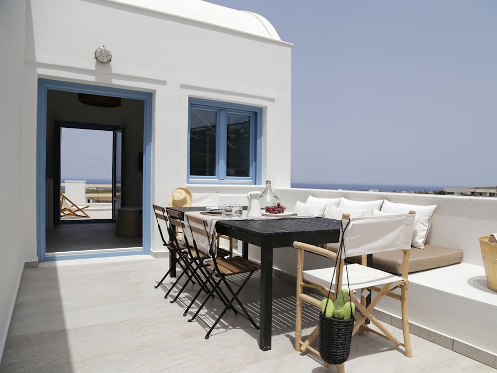 Dining terrace overlooking the ocean at Vino Villas