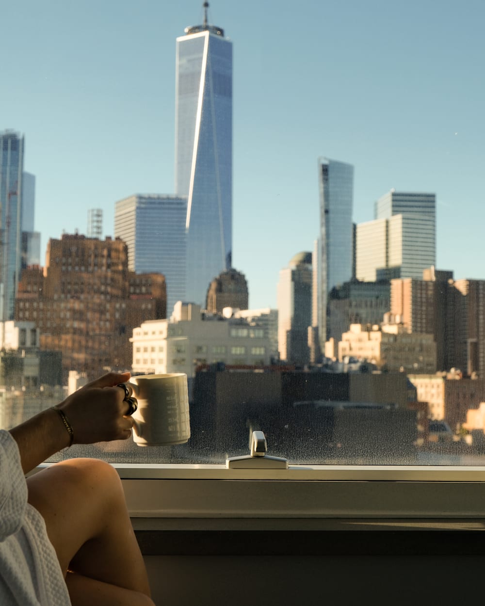Coffee and a view of the Freedom Tower and the New York skyline from a bedroom at ModernHaus SoHo hotel