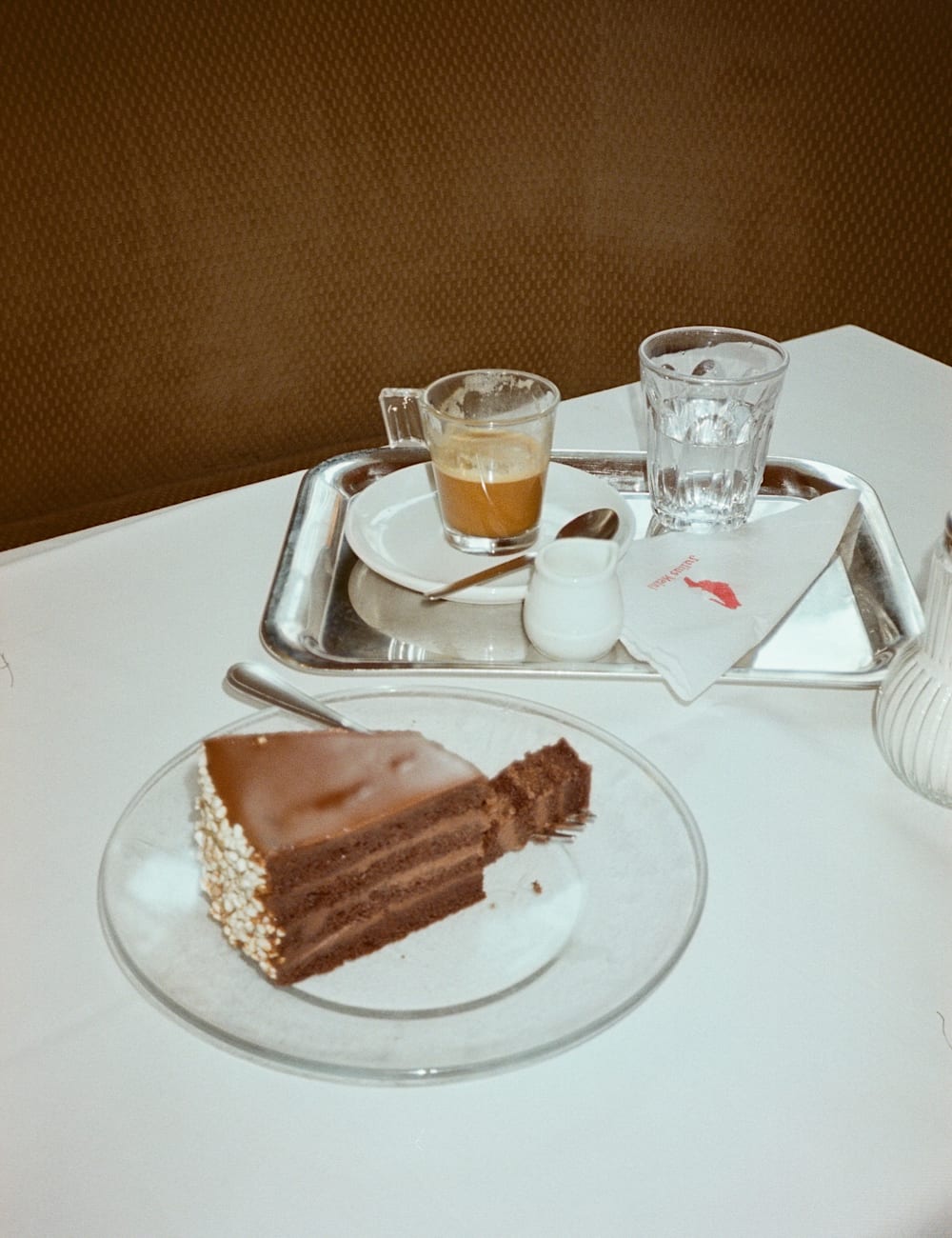 Slice of cake and coffee at coffee shop in Vienna, Austria
